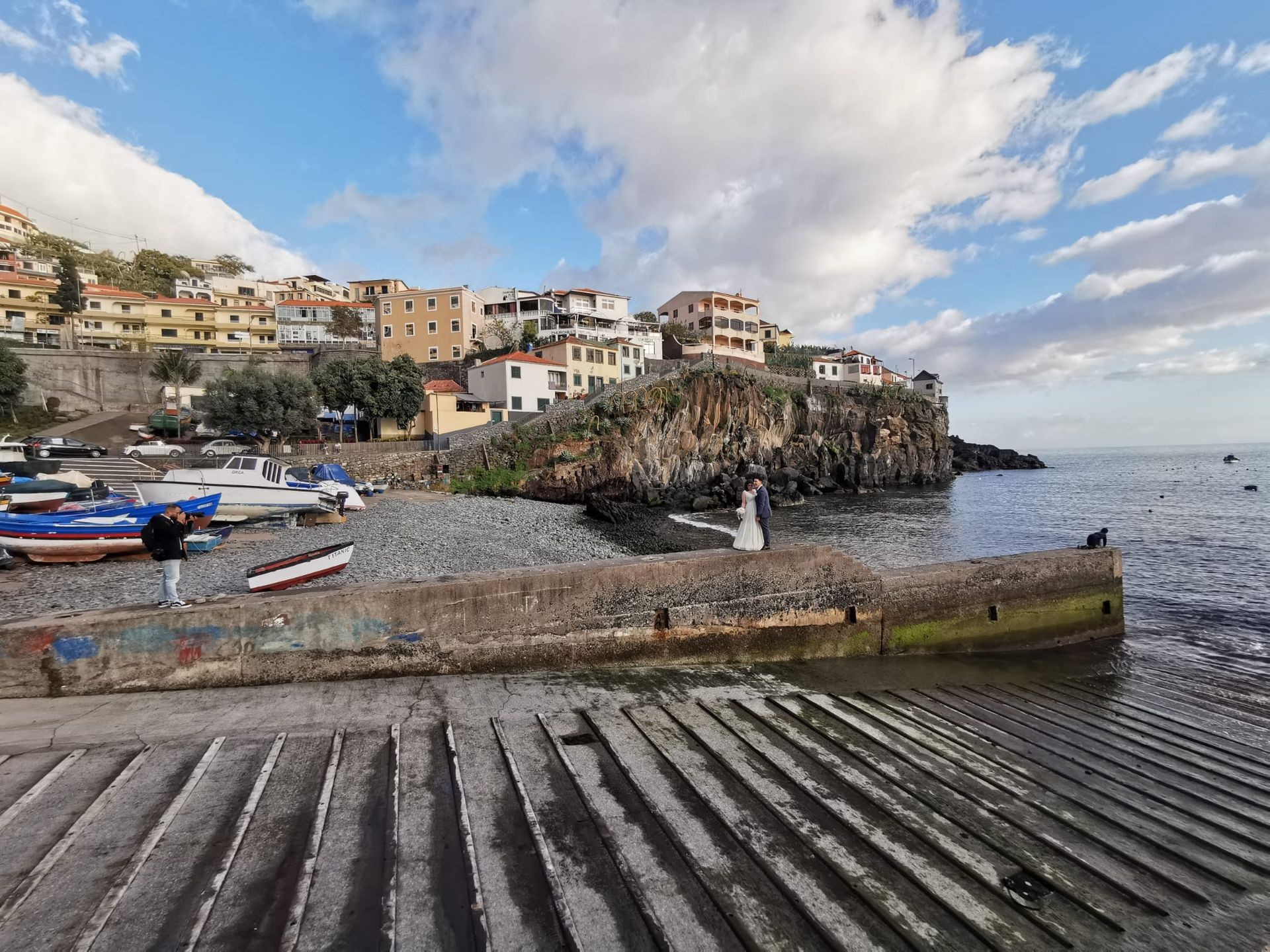 Traditional Madeira fishing village with colourful boats by the pier — picturesque setting for lifestyle, fashion and travel productions.
